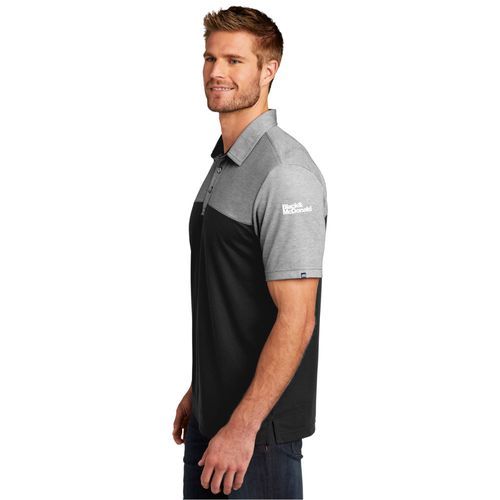 TravisMathew Oceanside Blocked Polo. image thumbnail