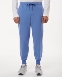 Image of Jaanuu Osmo 8-Pocket Scrub Joggers 