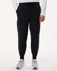 Image of Jaanuu - Osmo 8-Pocket Scrub Joggers