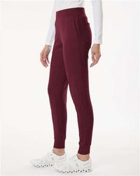Image of Jaanuu Women's Rubi Ultrasoft Scrub Joggers - Petite Sizes