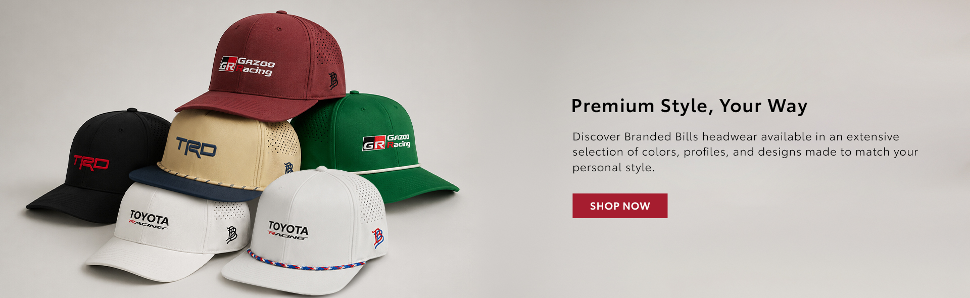 Pyramid of colorful hats emblazoned with various Toyota Racing logos. Caption reads: 